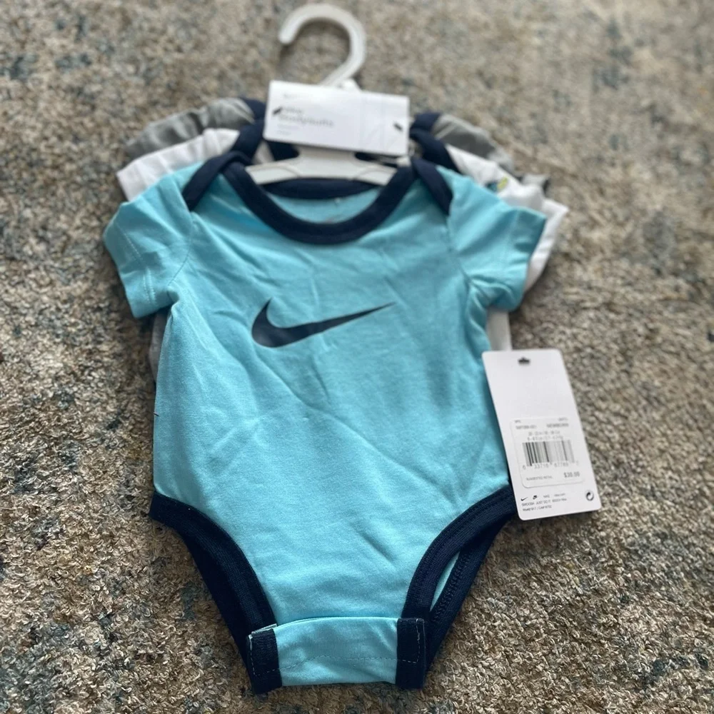 Nike Baby Short Sleeve Bodysuit in Aqua with Navy Trim